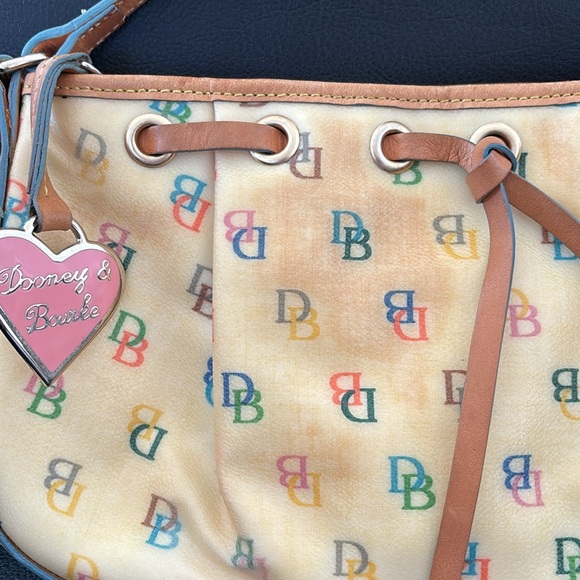 Dooney & Bourke second hand with stain - Picture 11 of 11